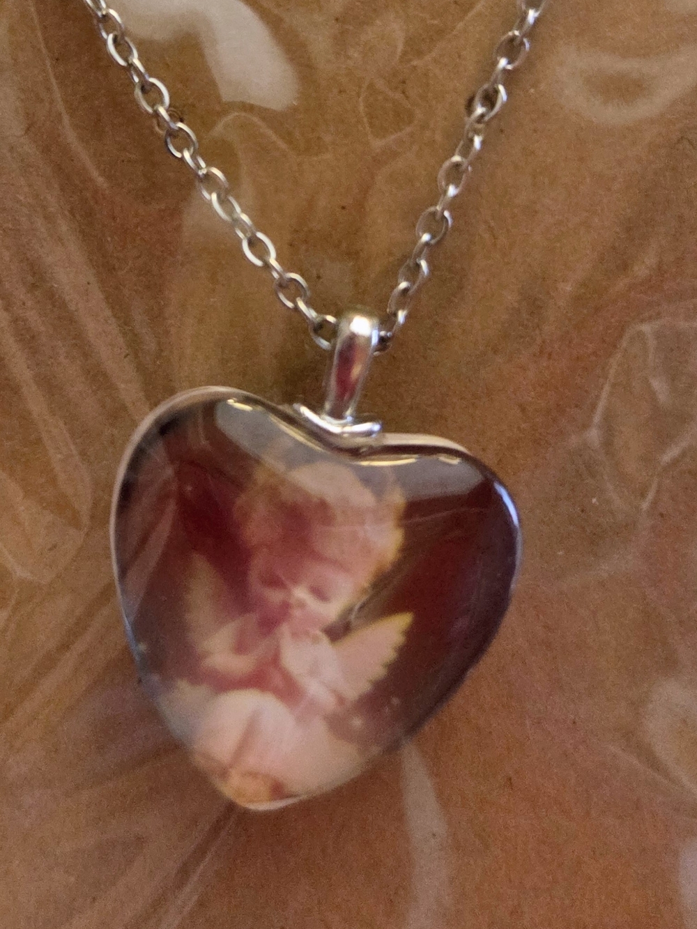 Heart Pendant Necklace with Pink Angel Motif in Silver-Tone